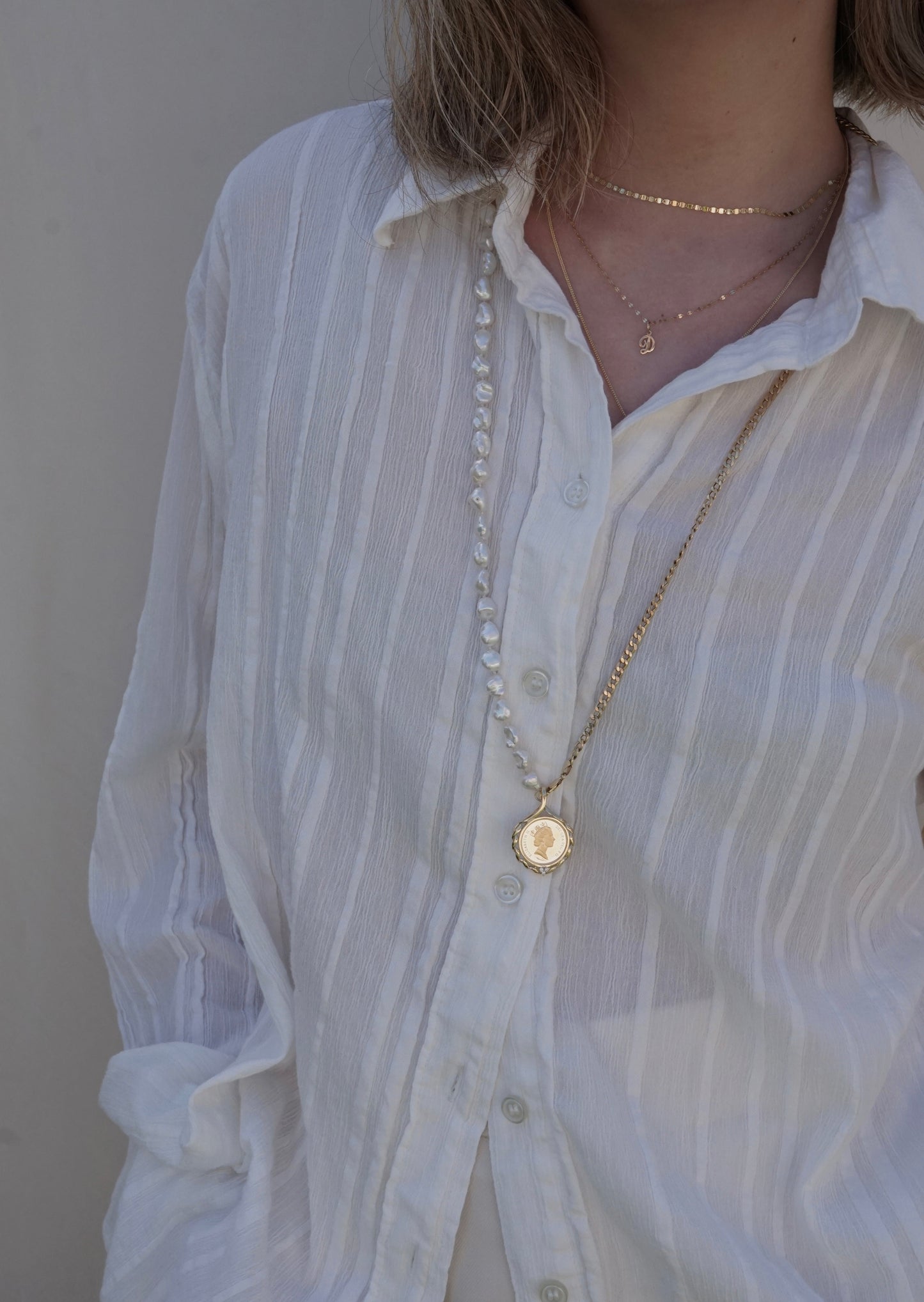 The HIKARI Pendant (18k gold frame & 22k gold coin)