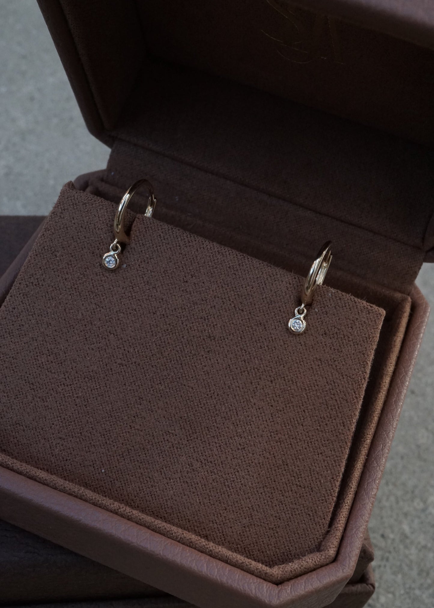 14k Dangling Bezel Diamond Huggies